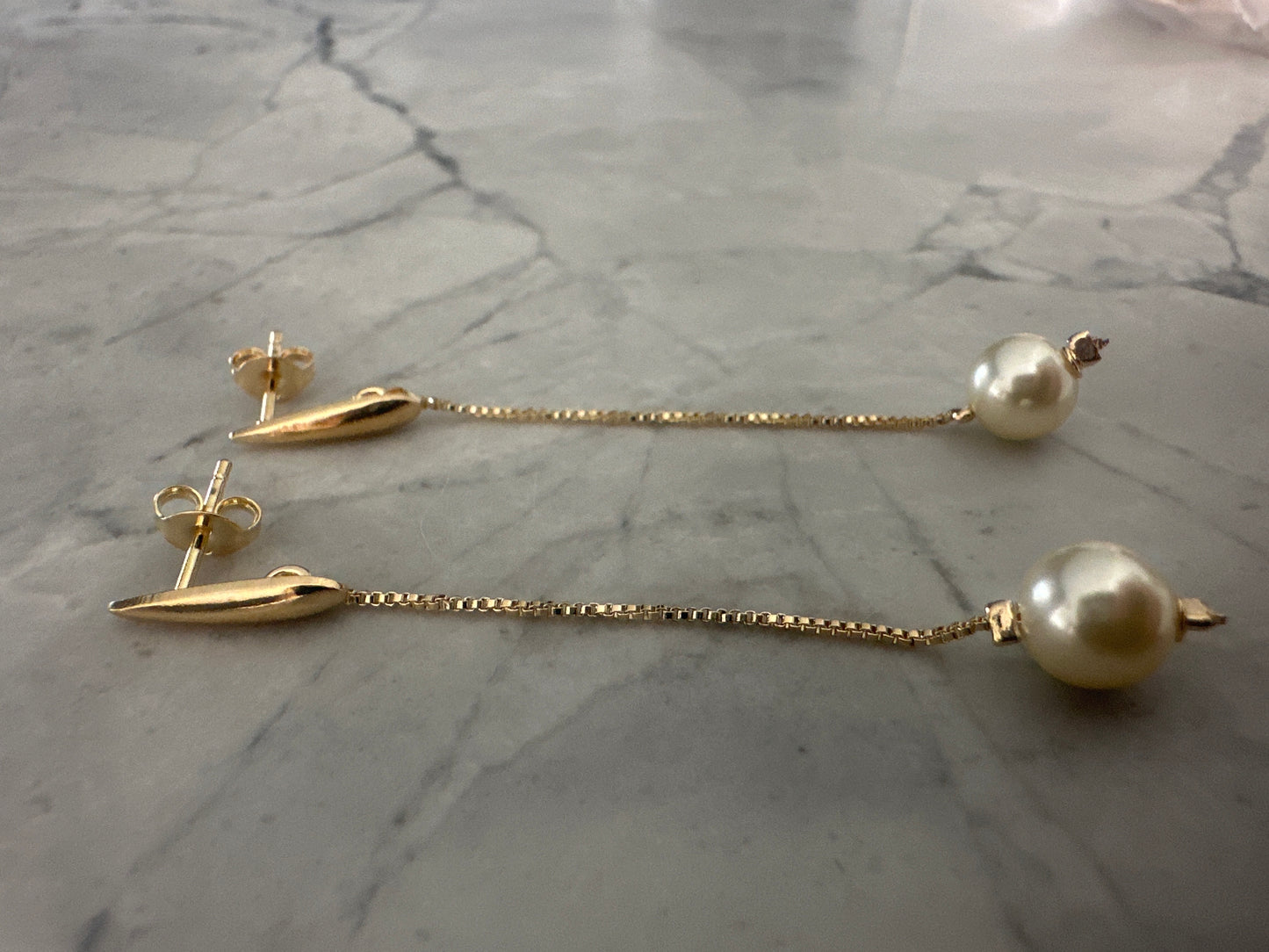 Pearl drop earrings gold